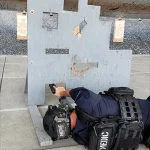 Students participating in live-fire range session during advanced tactical medicine training